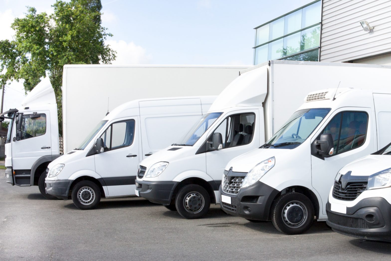 a row of different sized vehicles