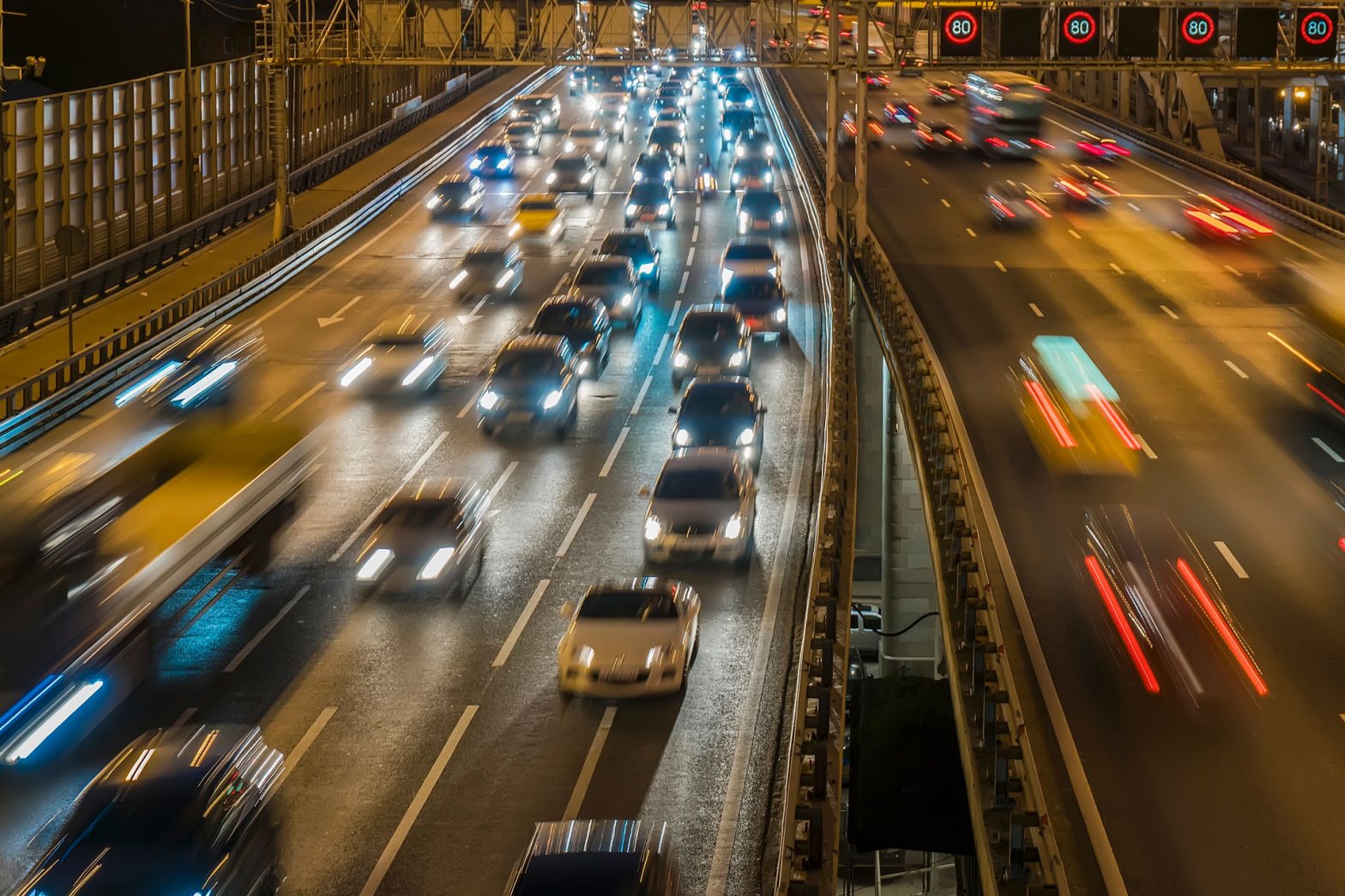 various cars stuck in traffic at night
