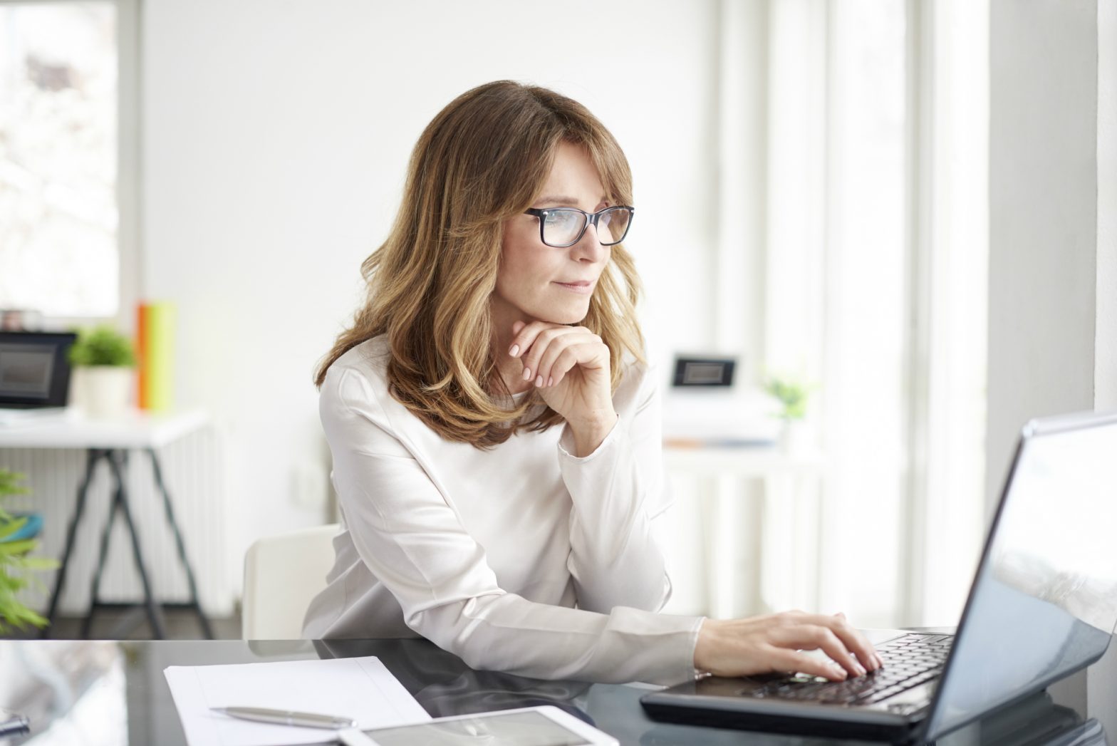Woman at computer desk