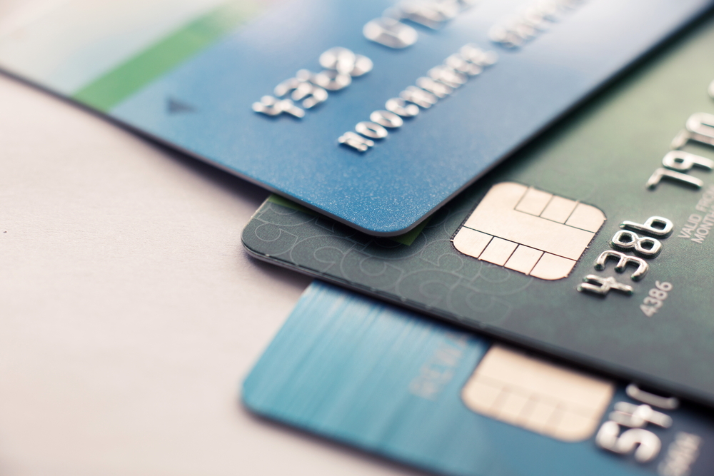 Stack of 3 payments cards fanned out