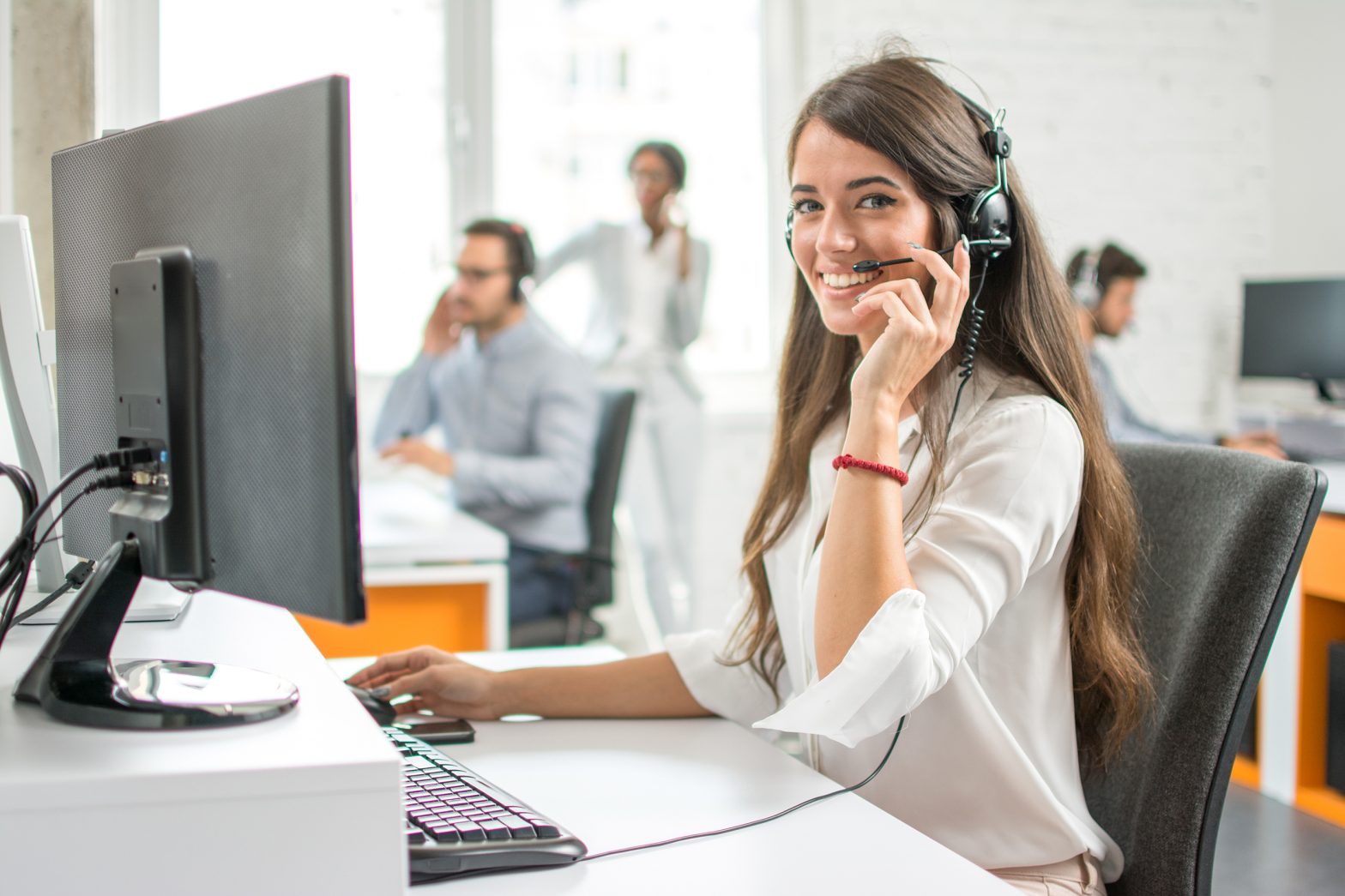 A member of a call centre helping a customer