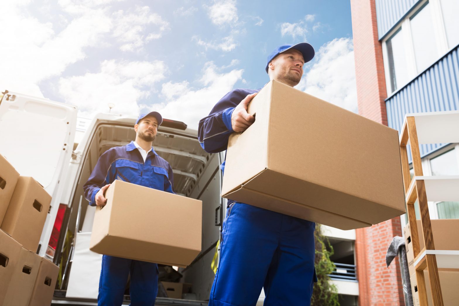 two men removing unwanted assets