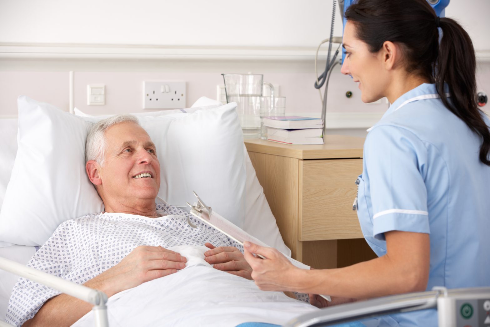 Doctor helping patient